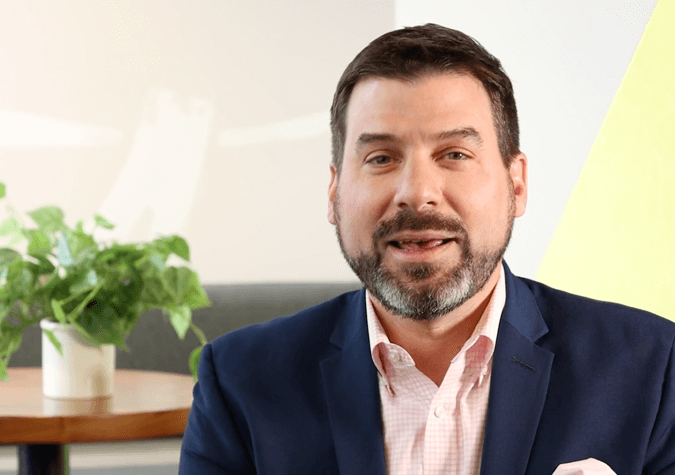 video thumbnail - man giving interview